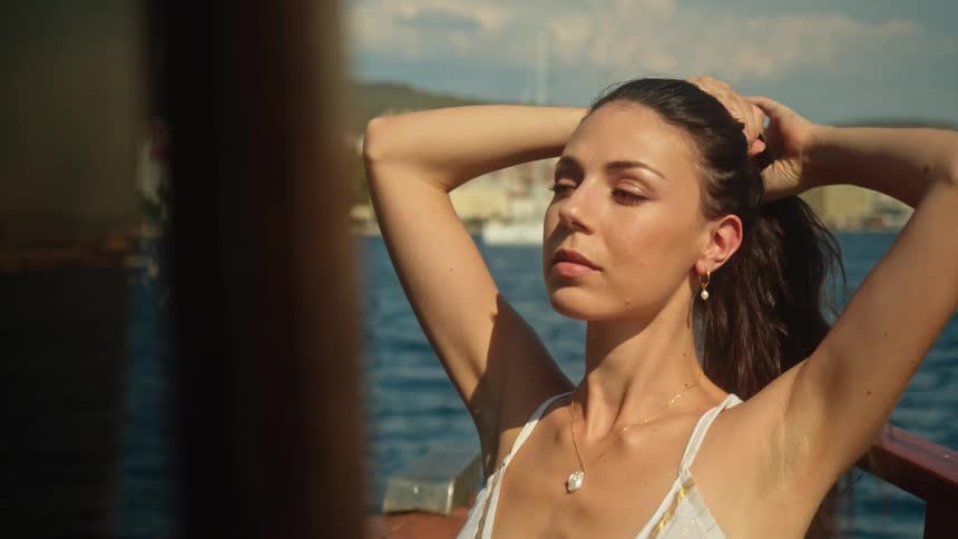 A woman is relaxing on the ocean water