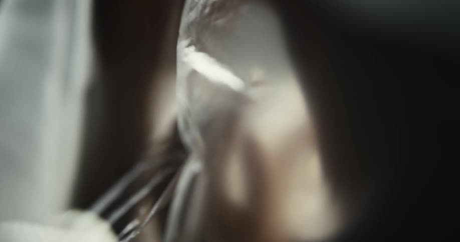 A person moves under the plastic