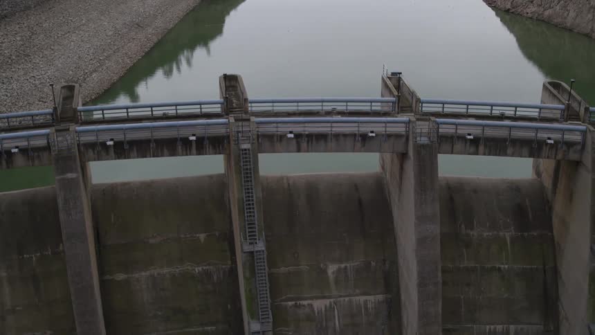 A dam holding back river water
