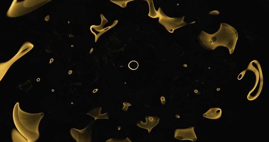 Yellow shapes increase in number around a oval shape at the center and all vibrate