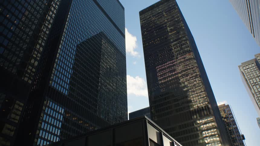 Aerial view of tall buildings are displayed in a city