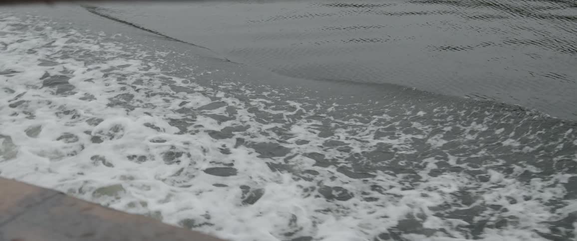 The boat is traveling in the ocean
