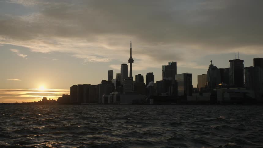 The sun is rising on the city