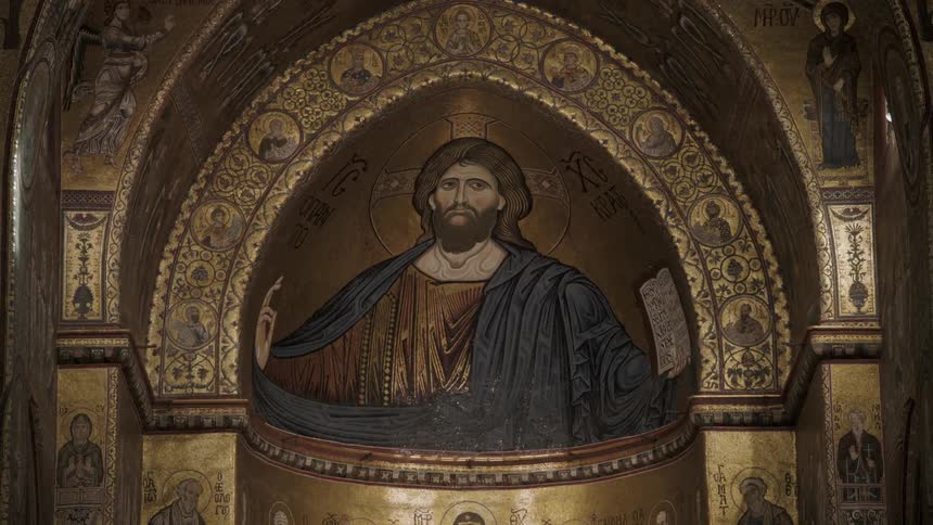 A painted religious figure in an alcove
