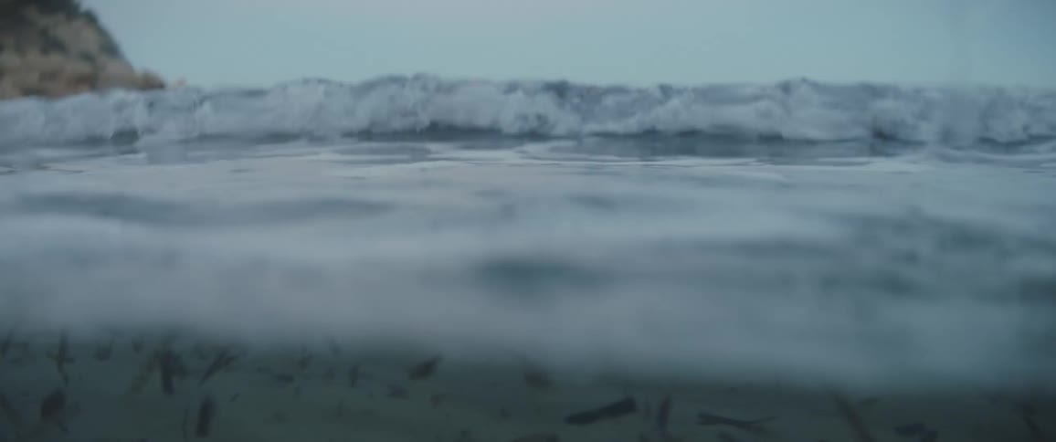 Ocean waves crashing down near a beach