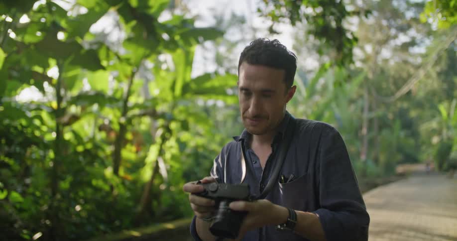 A person is outdoors taking pictures during the spring time
