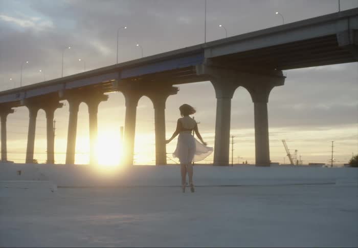 A woman dancing outdoors