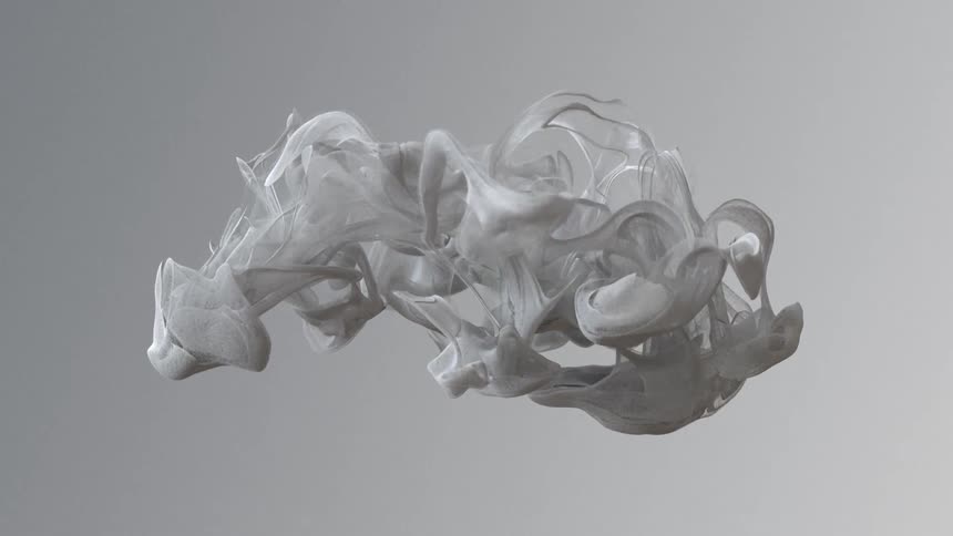 Gray filmy material floats against gray background