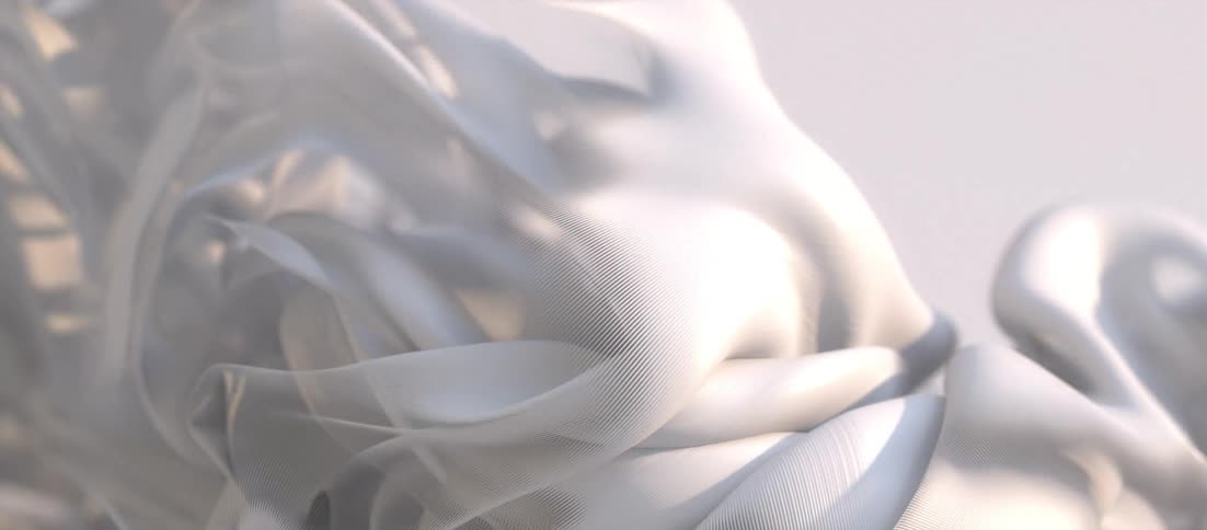 A white living substance is moving and folding as it bends and ripples