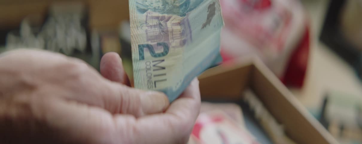 Close up of a man holding money
