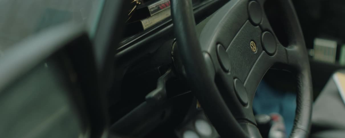 Books sit in passenger side seat of car