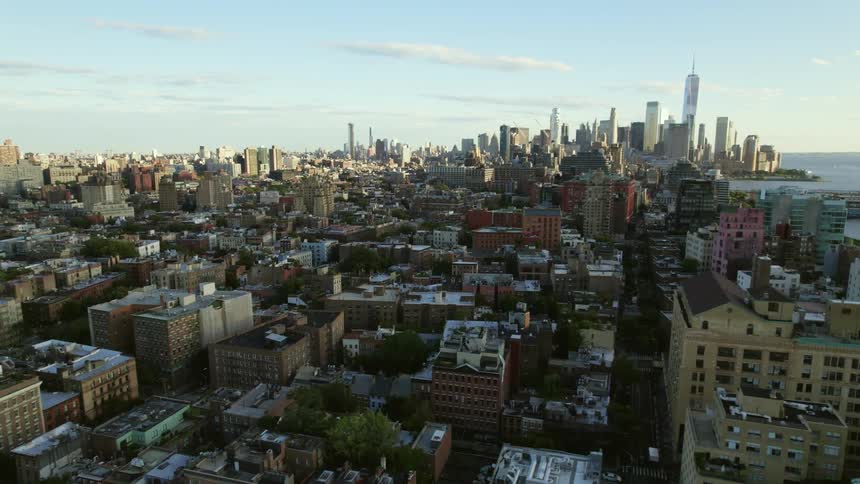 Aerial view of apartment buildings in the streets and skyscrapers in the city