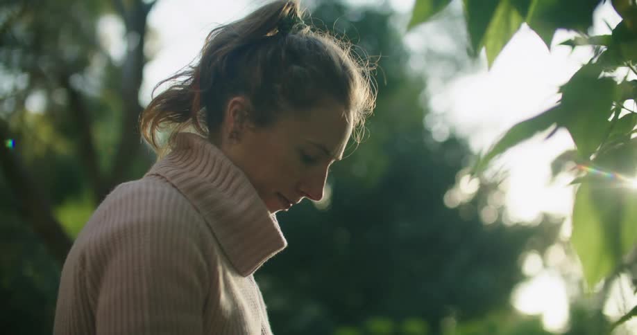 A woman standing outdoors