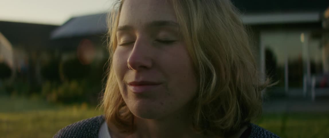 A woman sitting outdoors