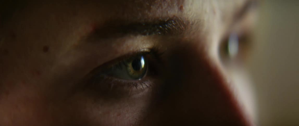 Close up of womans eyes looking into space