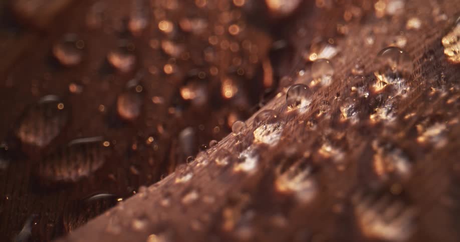 Water drops strewn and beading magnify surface