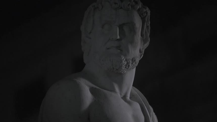 A stone statue of a man