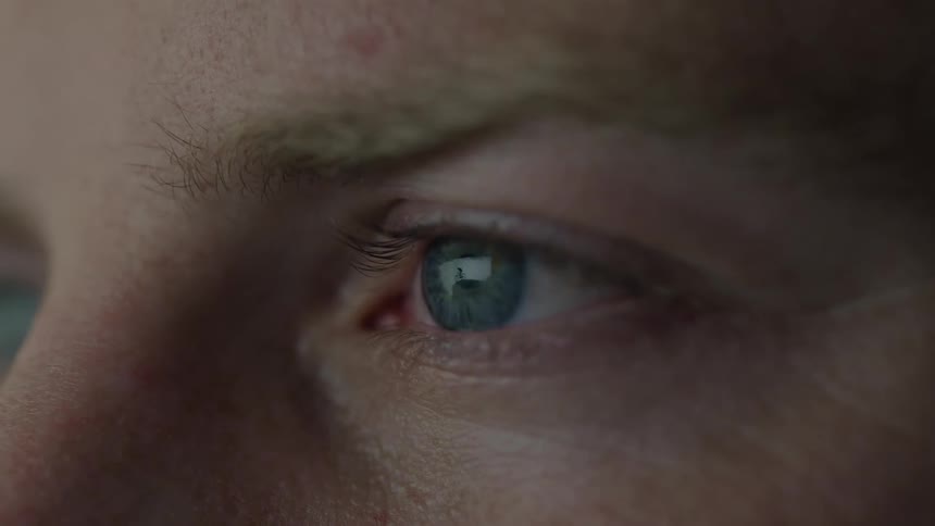 Close up of a persons eye as they blink