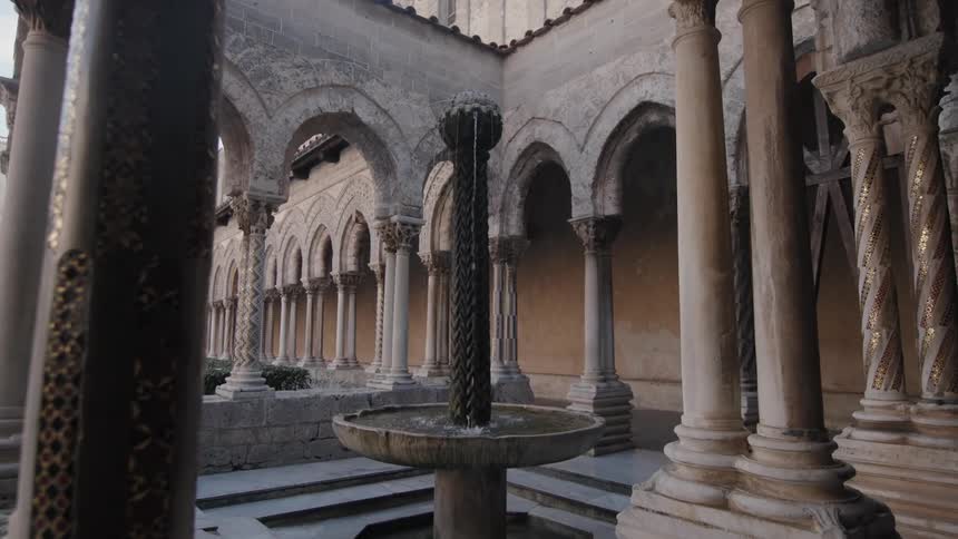 Fountain sitting in the middle of ancient architecture