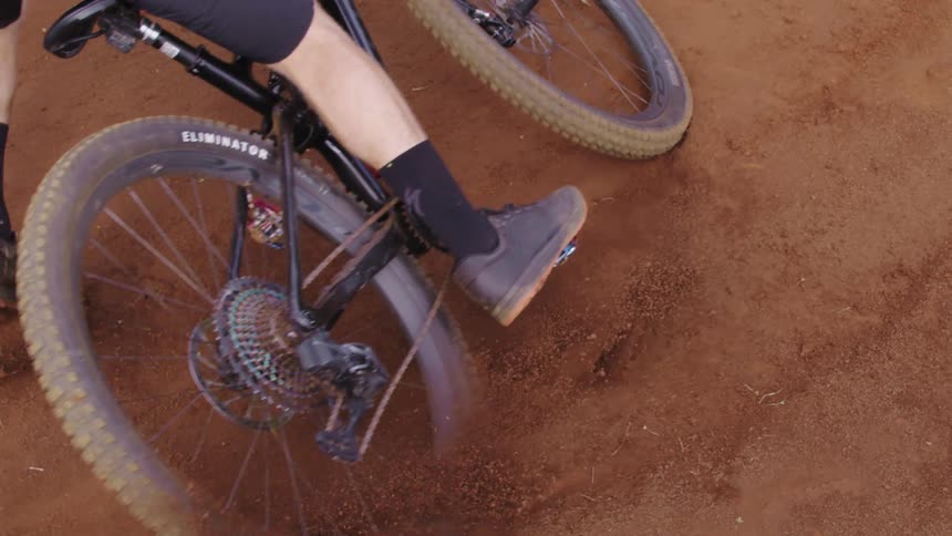 Slow motion footage of a person riding a dirt bike