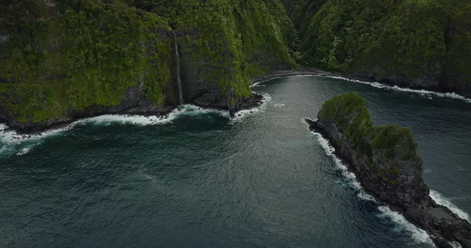 Aerial view of island in the ocean is displayed