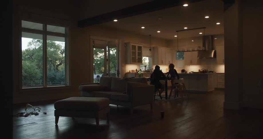 A father and daughter in a house