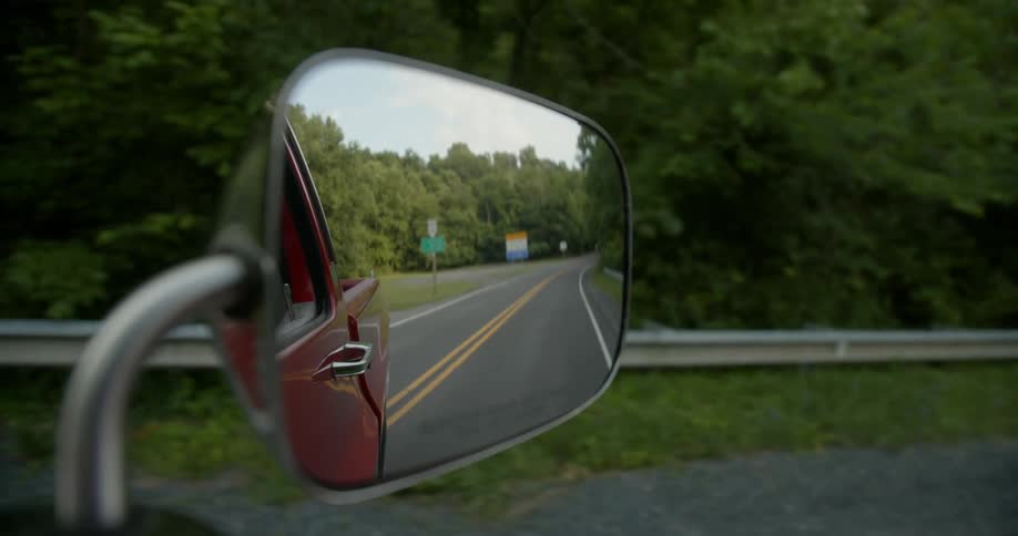 A view of a truck driving outdoors