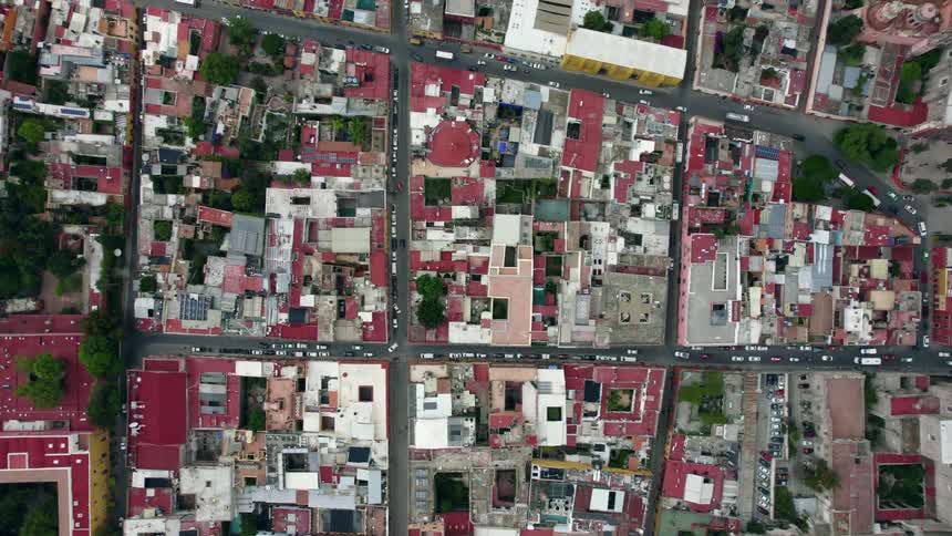 Cars traveling on city streets laid out in a grid pattern