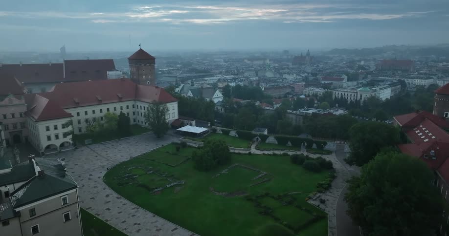 Aerial view of a city during spring is displayed