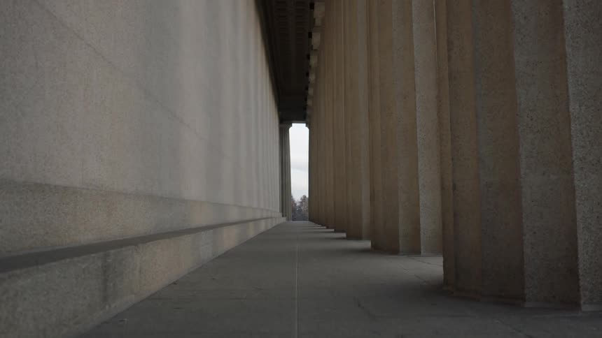 Stone pillars on a building during the day