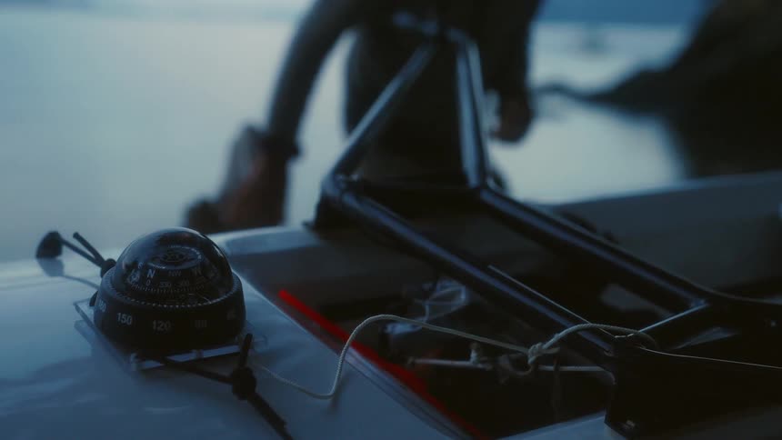 A compass is connected to the canoe