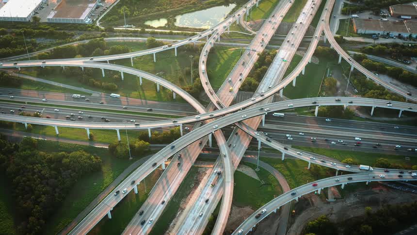 Cars traveling on an urban highway system