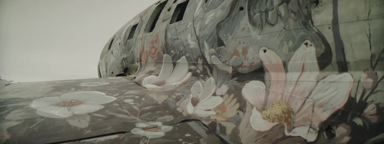 A mural painted on the outside of an airplane