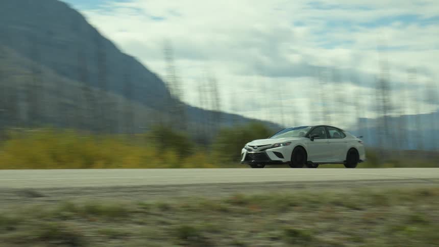 A car driving down a road