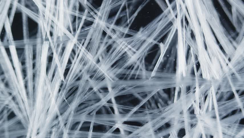 Cracks in glass form a starburst pattern
