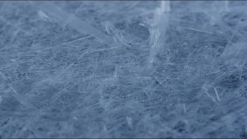 Ice crystals form densely creating pale shards