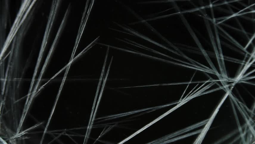 Time lapse close up of of sharp thin frosting ice crystals forming