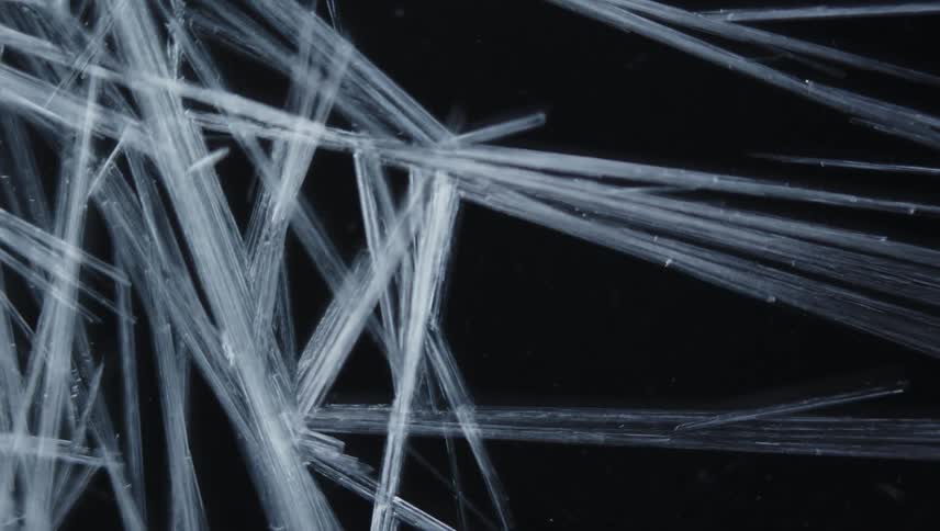 Time lapse close up of of sharp thin frosting ice crystals forming