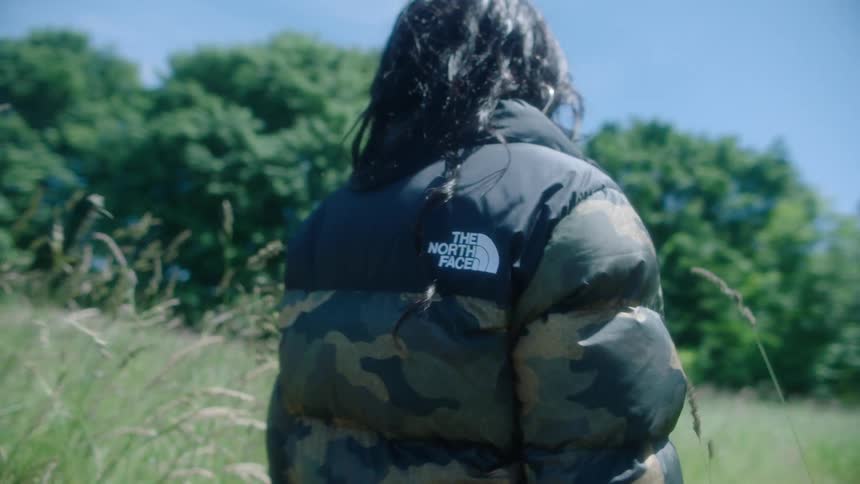 A woman hikes on the field