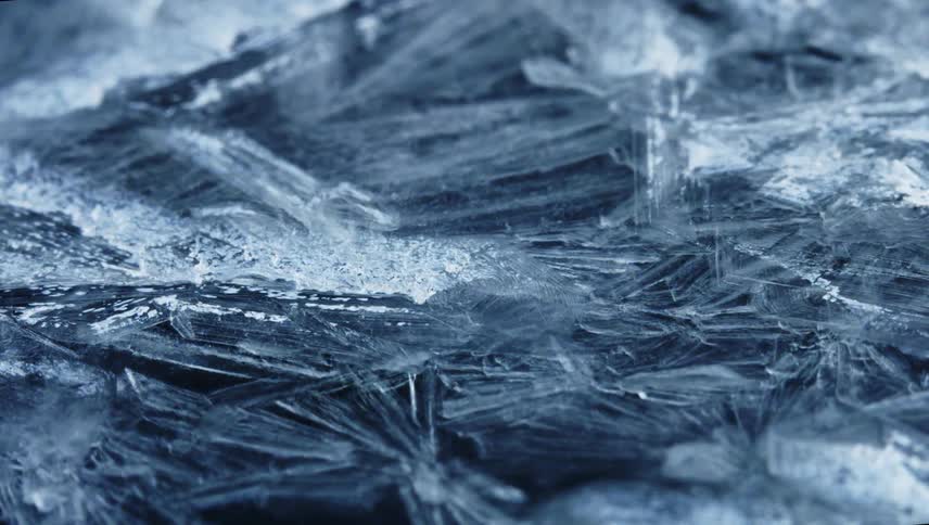 Time lapse close up of of sharp thin frosting ice crystals forming