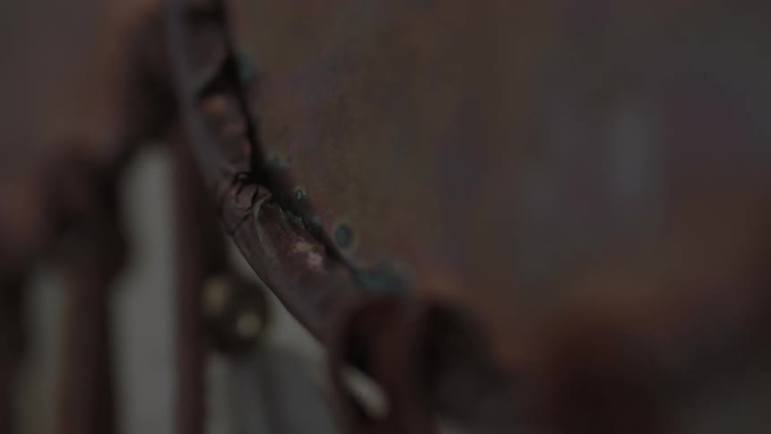 A leather drum sits on a shelf