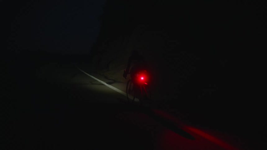 The bike has a flashing rear light at night