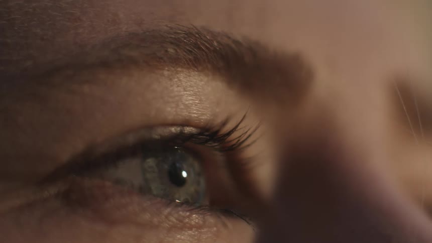 A woman is looking around