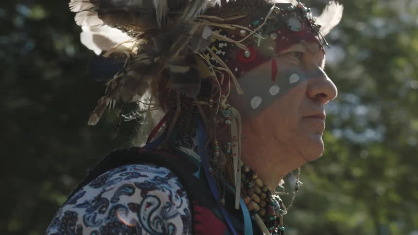 A native american man gazing into the distance
