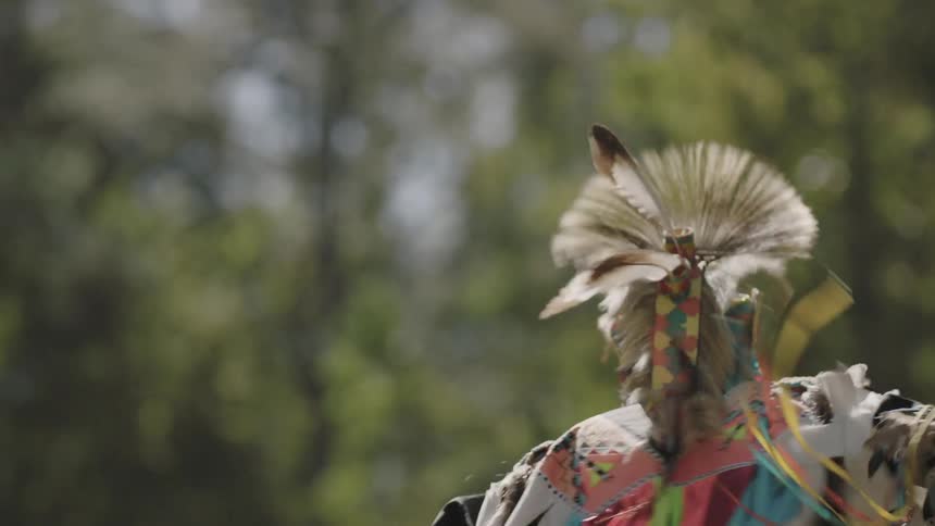 Tribal man dancing at a celebration