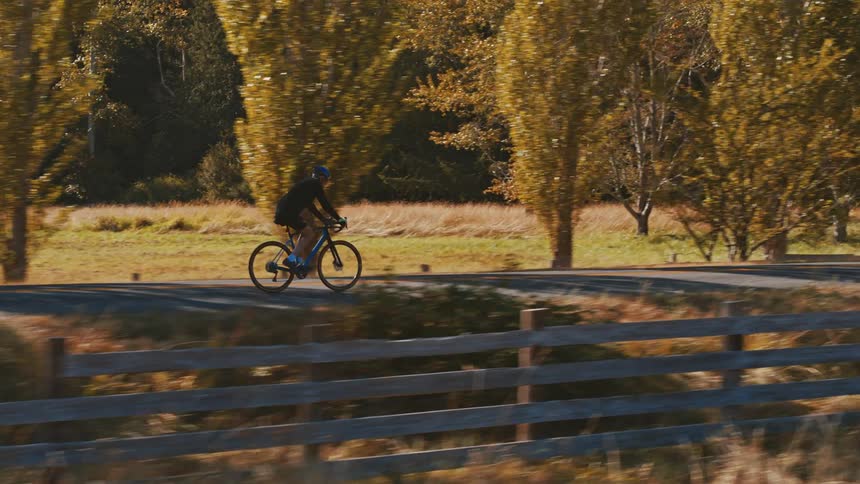 A man riding a bicycle outdoors