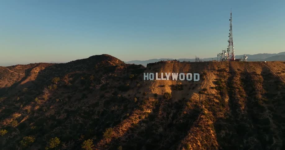 The radio tower and hollywood sign on mount lee in california