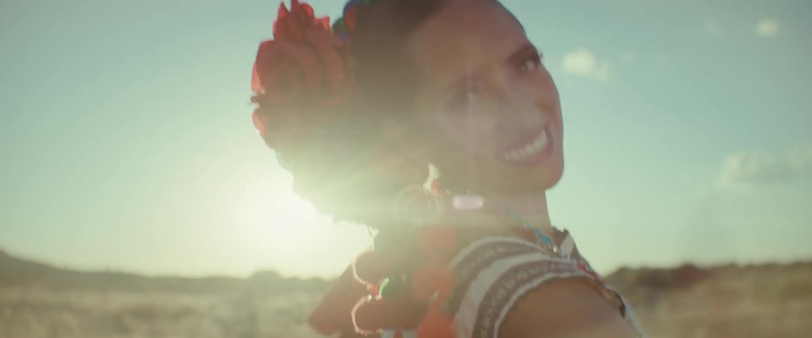 A woman dancing outdoors