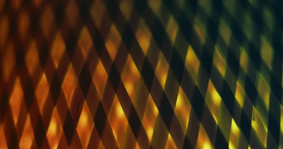 Lights behind a lattice fence