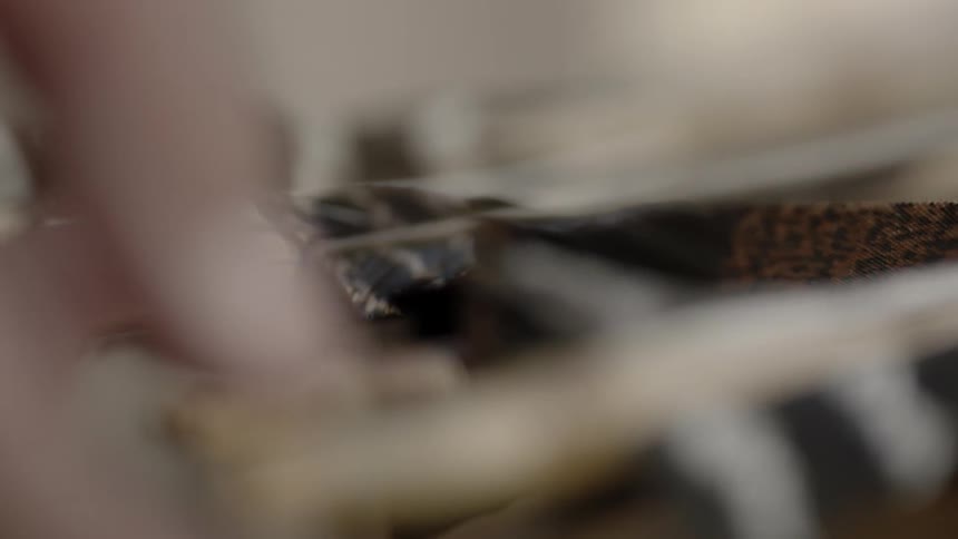 Extreme close-up of someone examining arrows